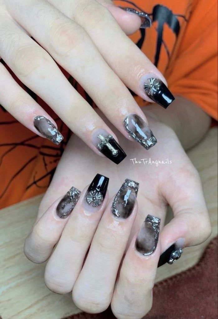 Beautiful black nail style with luxurious mother of pearl
