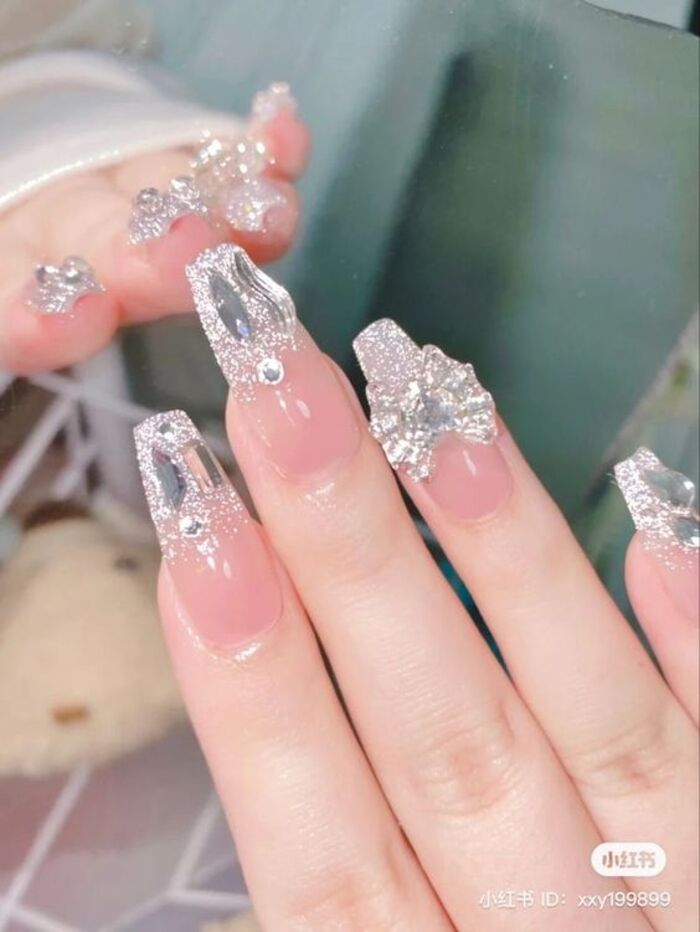 Nail style for brides with clear nails studded with glitter
