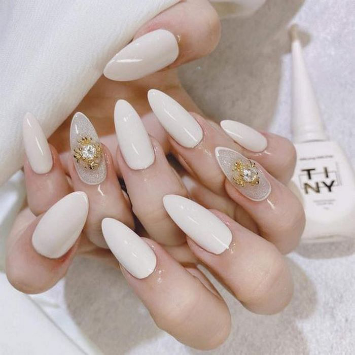 White hand nails stand out the most