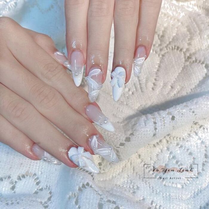 Luxurious white bridal nail design