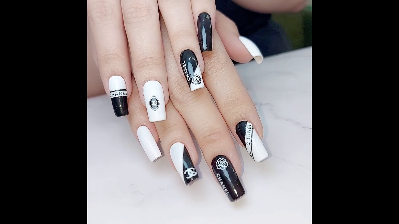 Elegant chanel-inspired nail designs with elegant styling — design 17