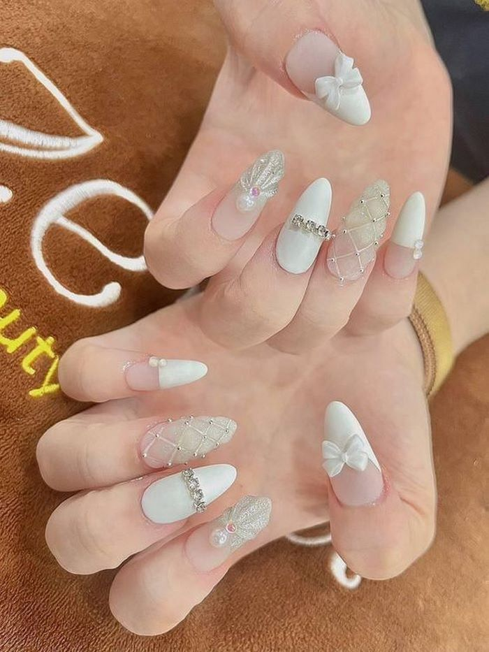 Impressive white nail design for her