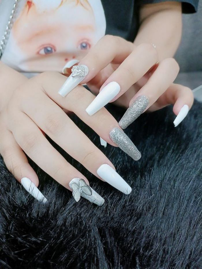 Suggested white nail designs with stones and glitter