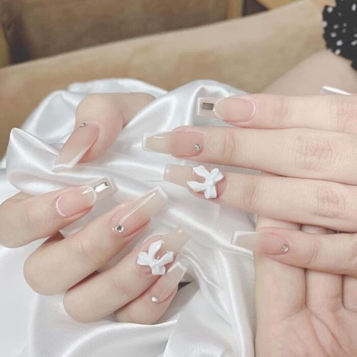 Beautiful white nail design for the wedding day