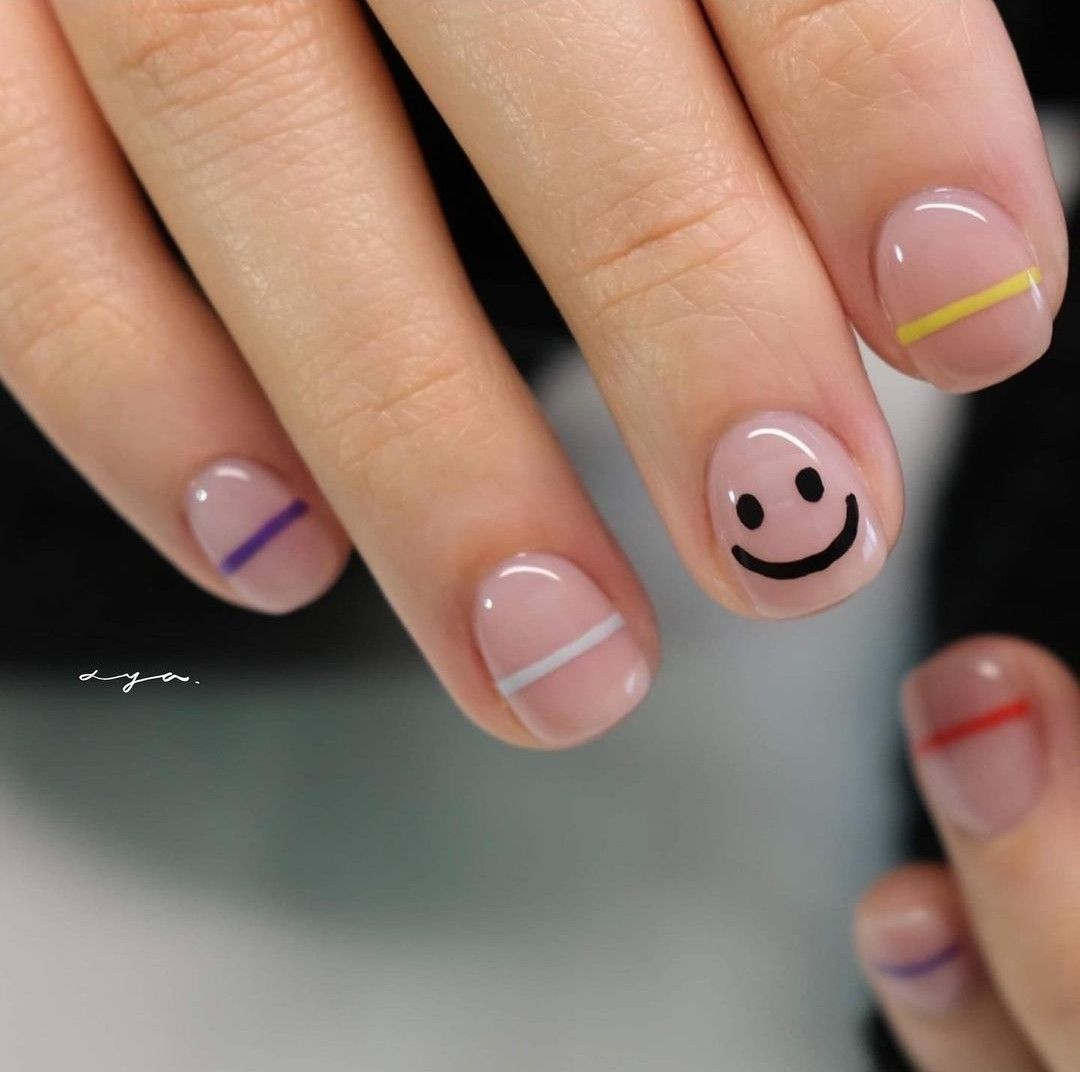 Cute smiley face nail design