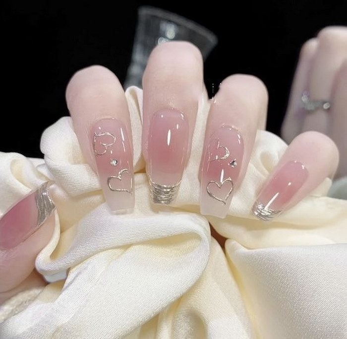 Beautiful pink rhinestone nails for her