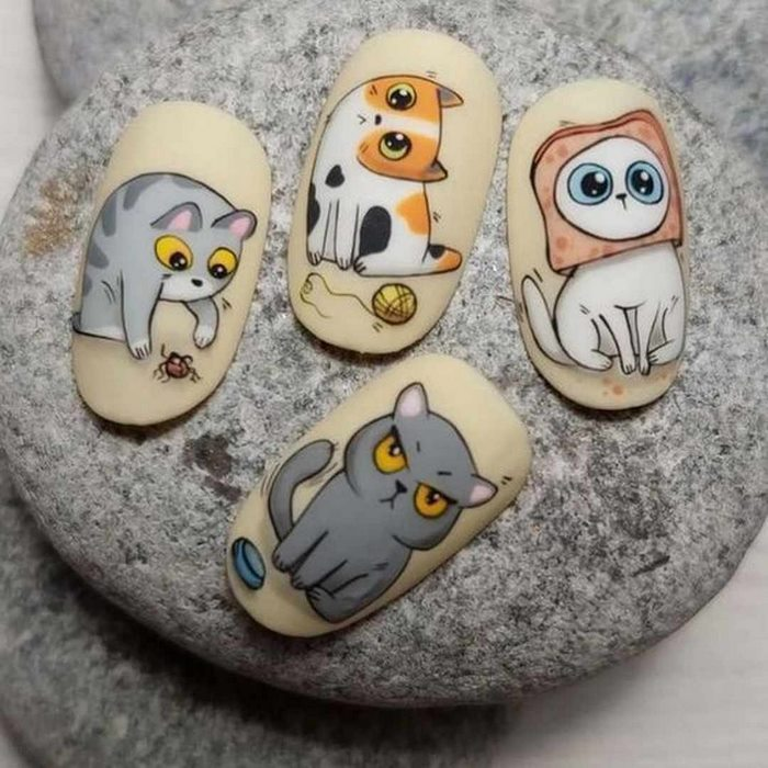 Cat-painted nails combine art and fun