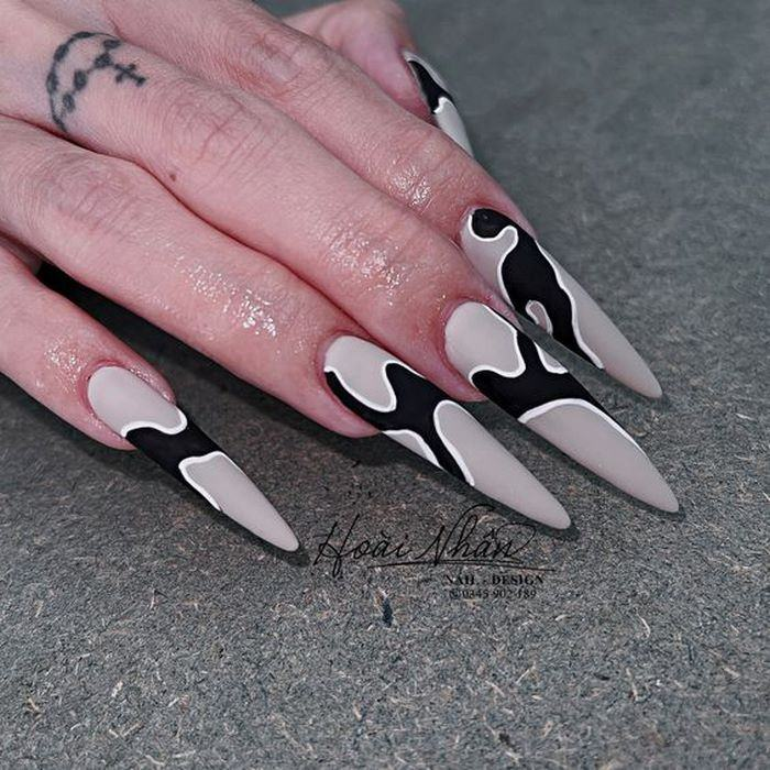 Long, pointed nail forms are the most prominent