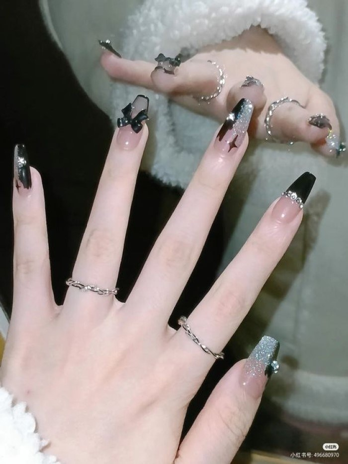 Chic black nail designs with black accents, elegant styling — design 20