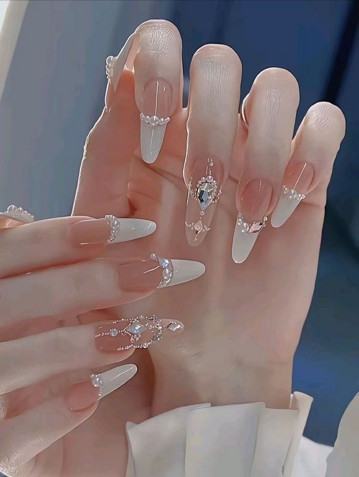 Soft pink jelly nail designs with rhinestones, pointed tips, pink accents — design 8