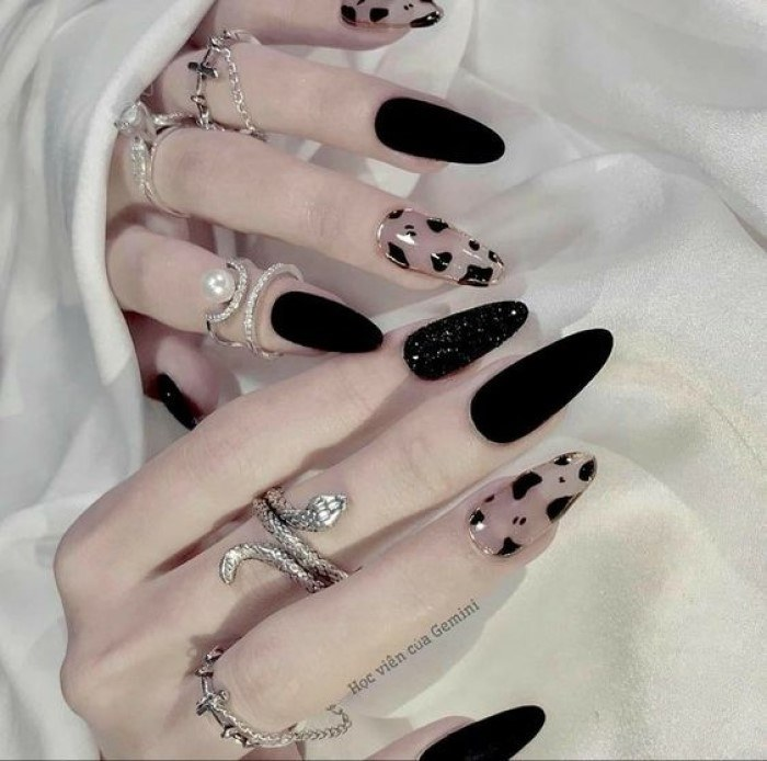 Chic black nail designs with pink accents, black accents, elegant styling — design 18