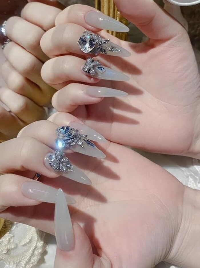 Unique long opaque white nail design