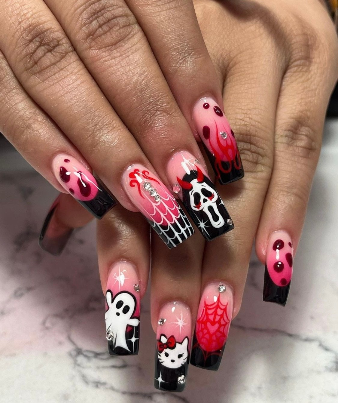 Highlight your personal style this Halloween with bold and impressive nail designs